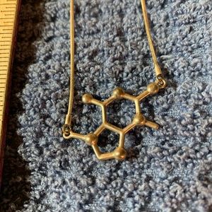 Caffeine molecule necklace